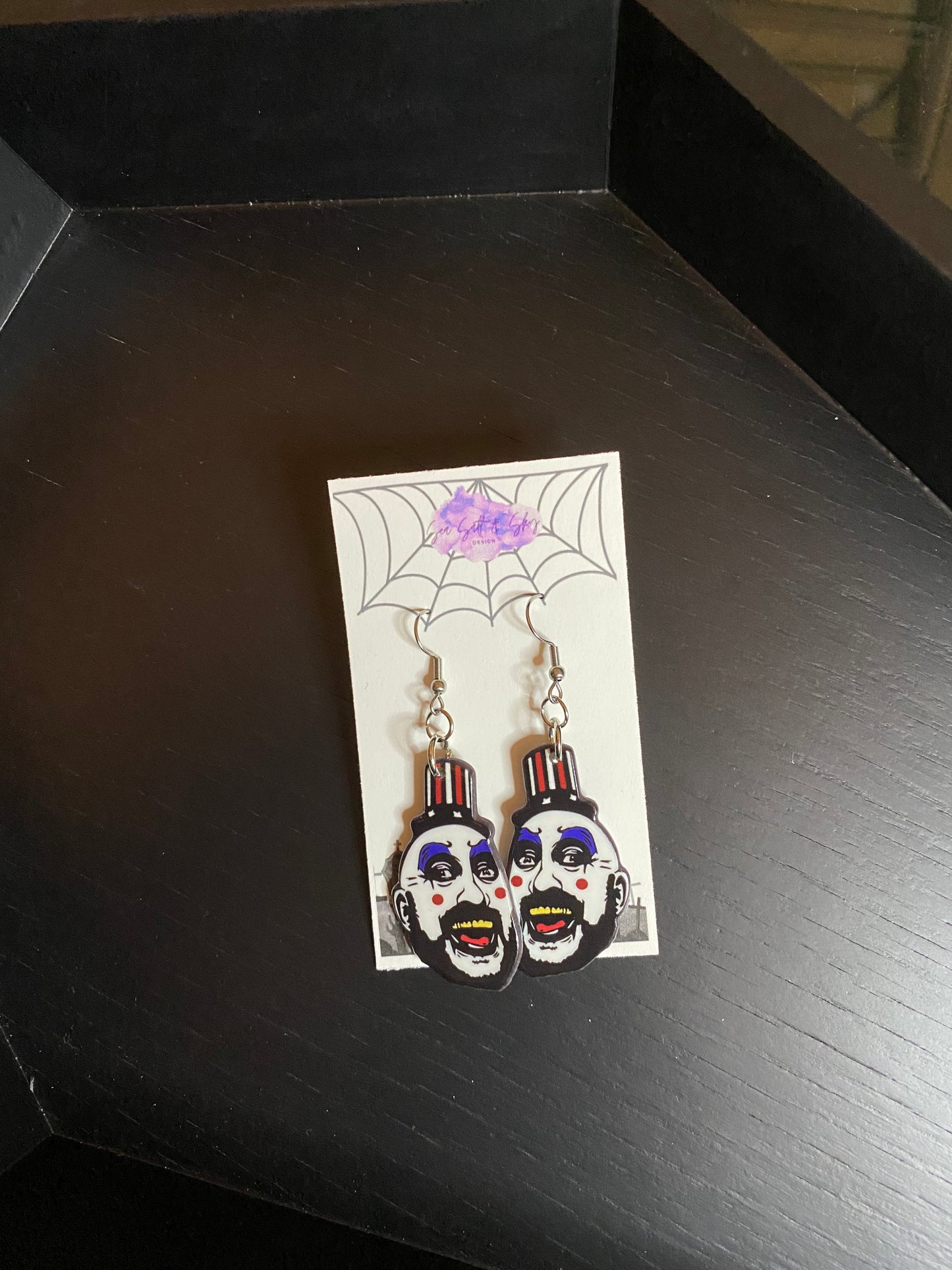 Captain Spaulding earrings