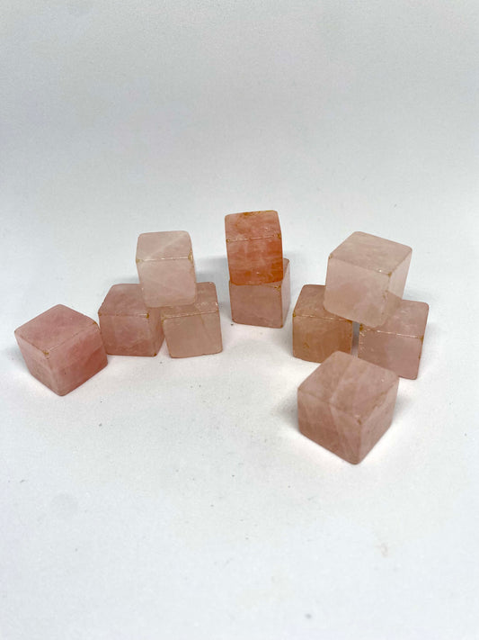 Rose quartz cube tumbles