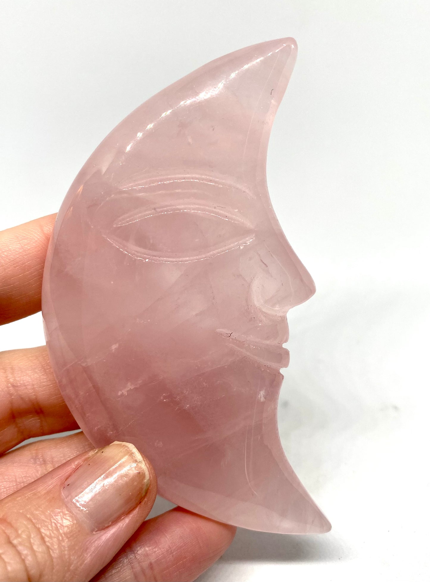 Rose quartz moon carving