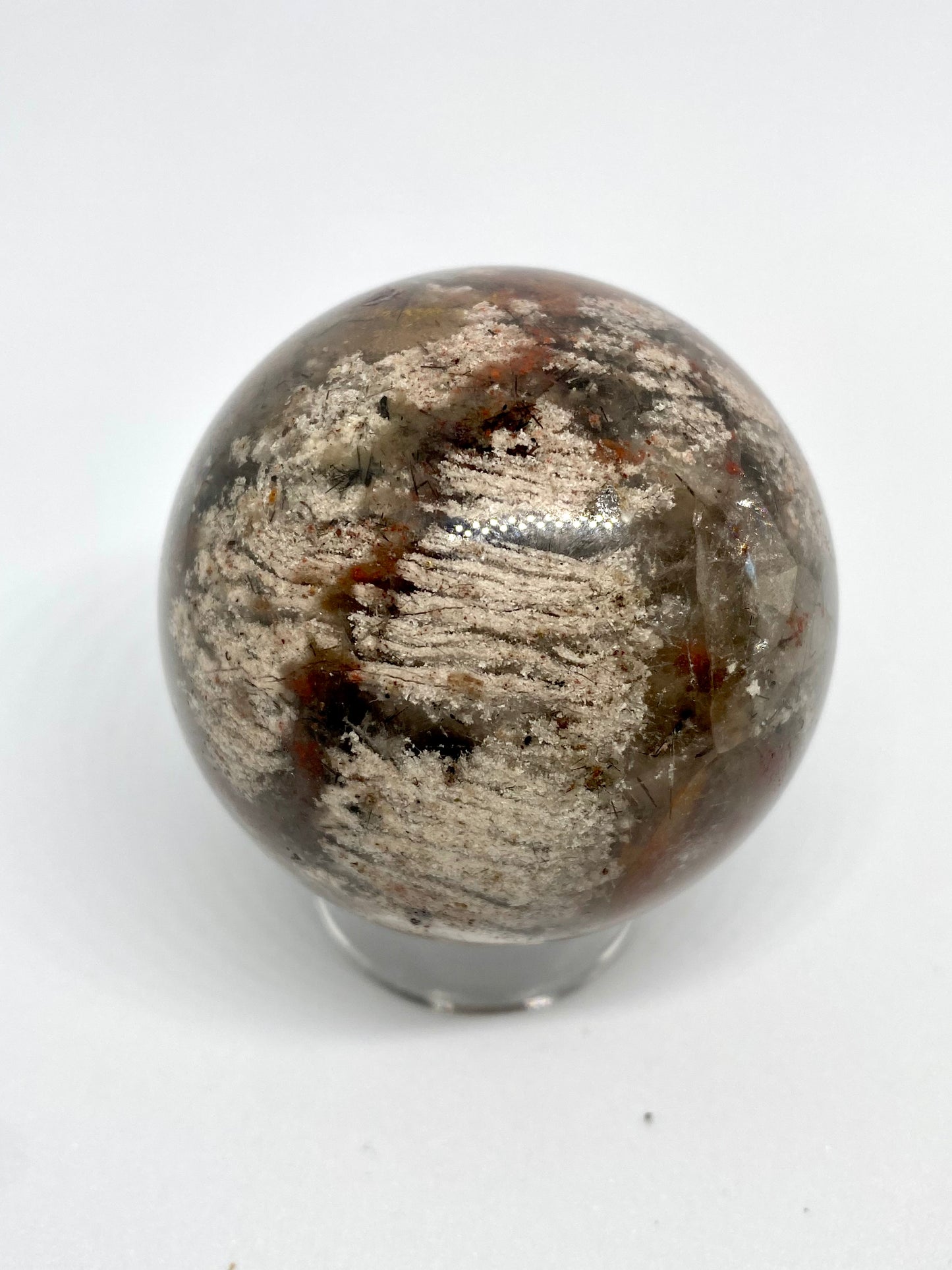 Garden quartz sphere w thousand layer inclusion