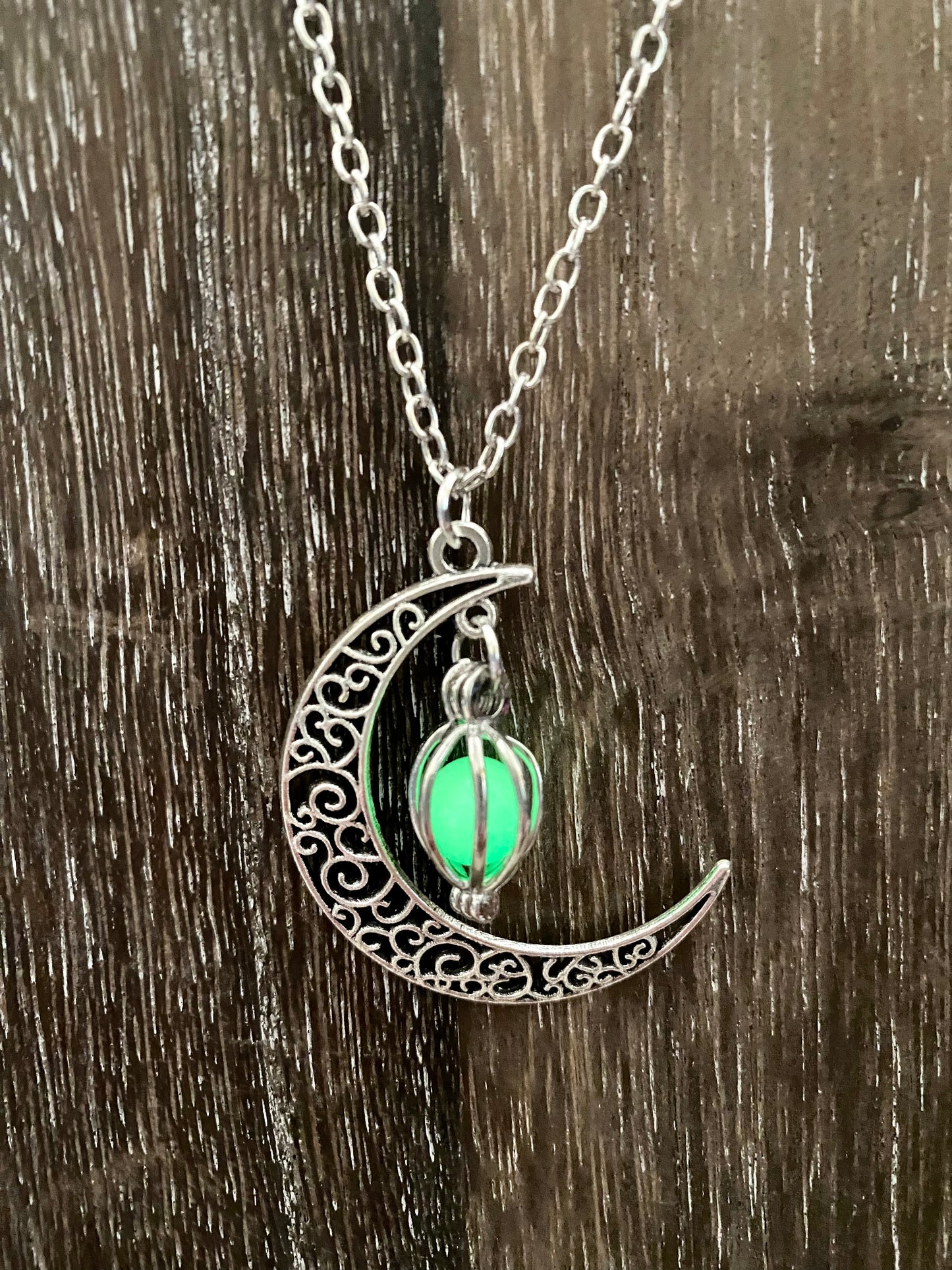 Luminous crescent moon necklace