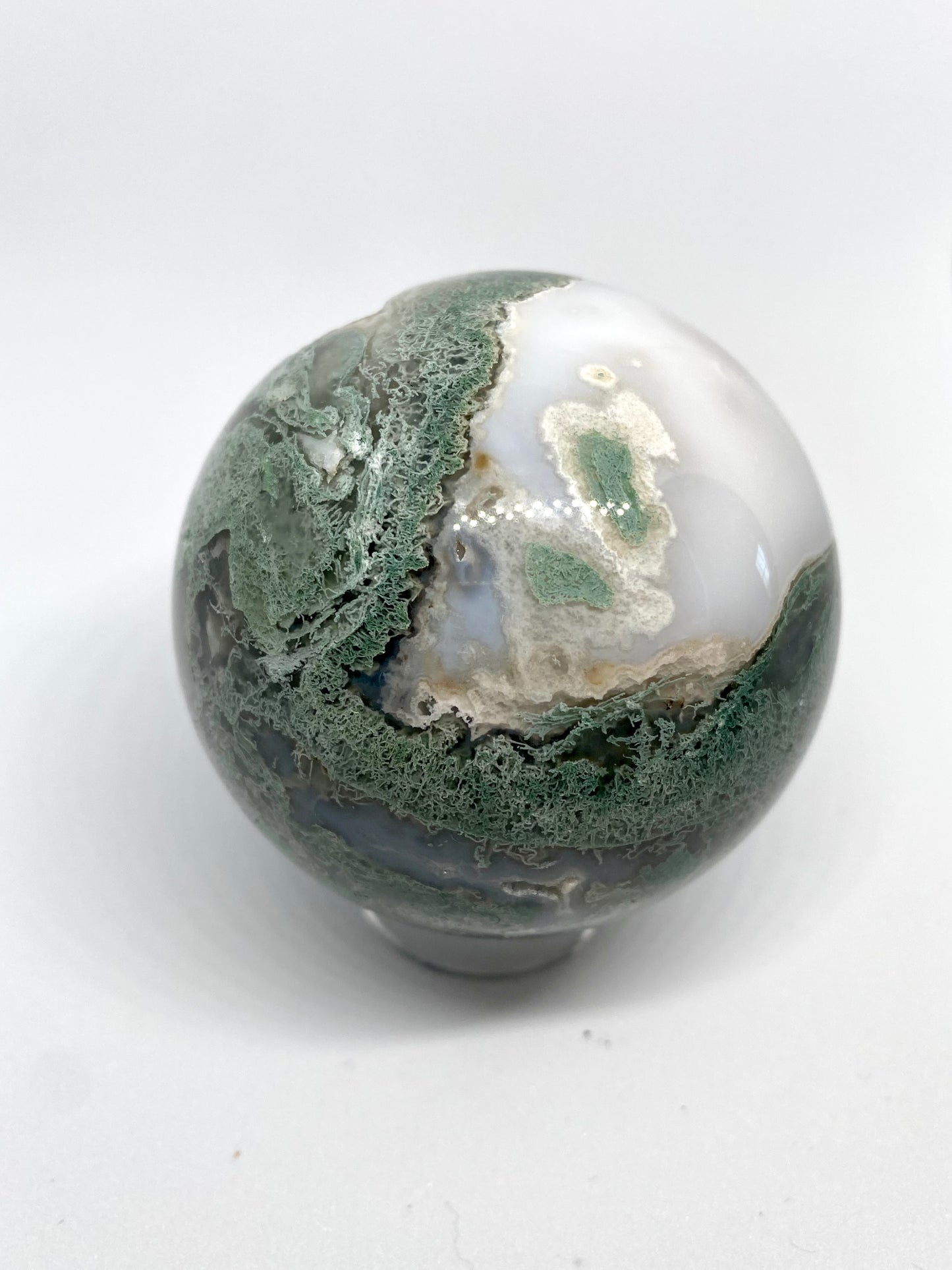 Moss agate sphere with druzy