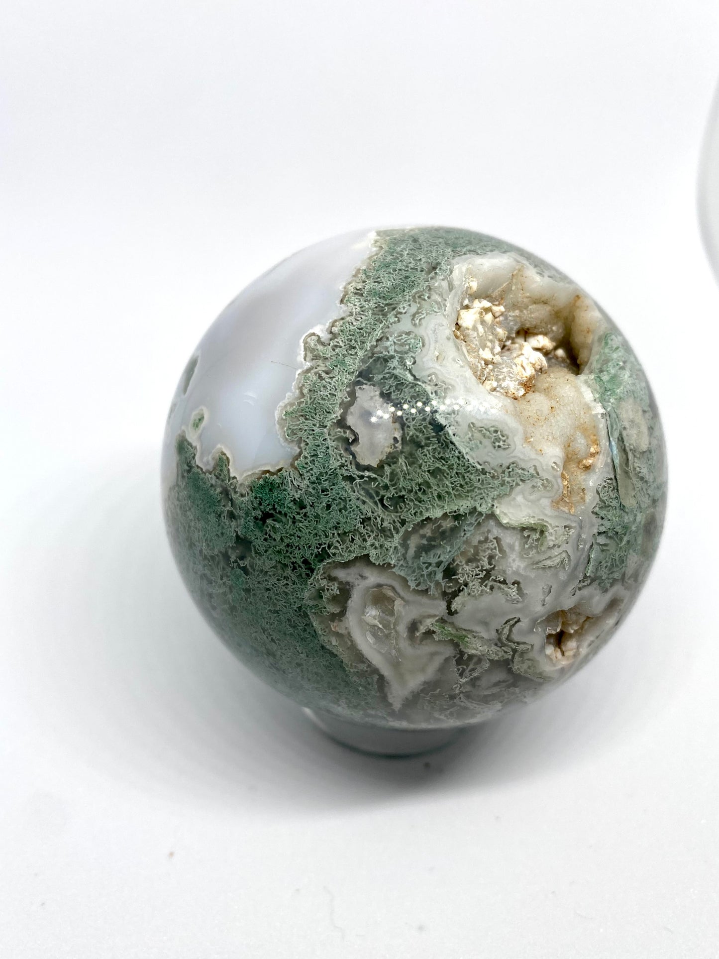 Moss agate sphere with druzy