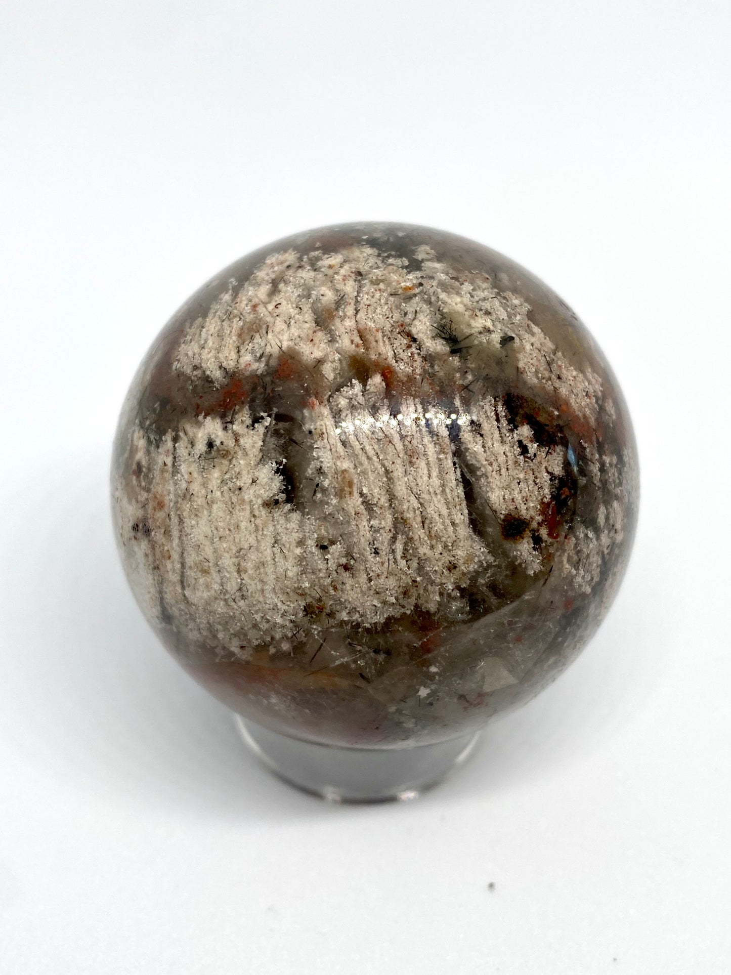 Garden quartz sphere w thousand layer inclusion